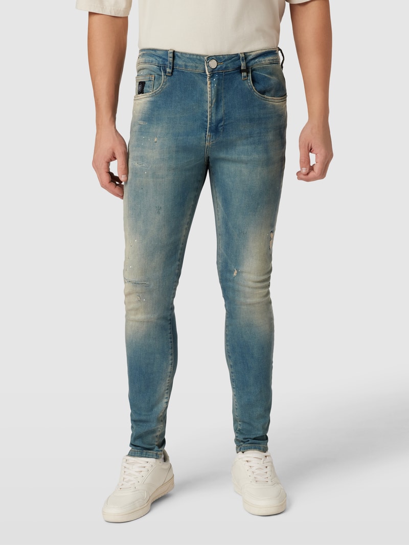 Tapered Fit Jeans im Destroyed-Look Modell 'Noel' in hellblau