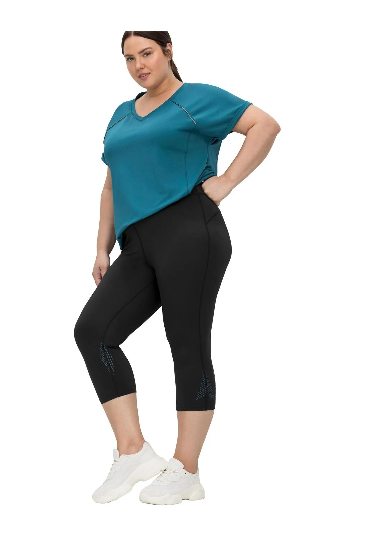 Sheego  Sport-Leggings - Schwarz - Mittlerer Bund