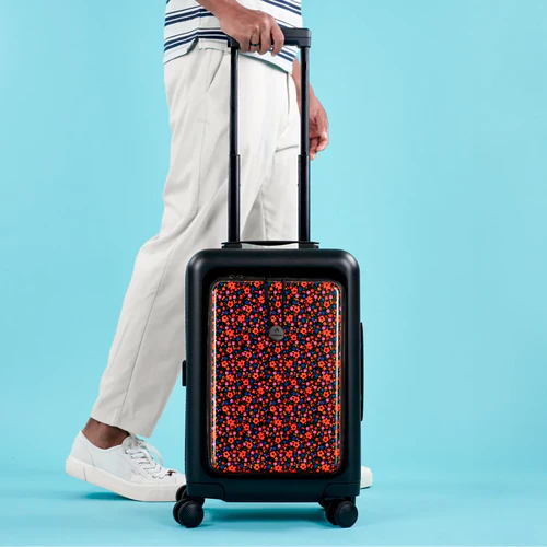 ORLY 4-wheel hard-shell suitcase with MAD black pouch