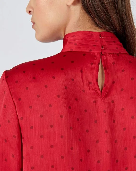 Blouse col montant satinée