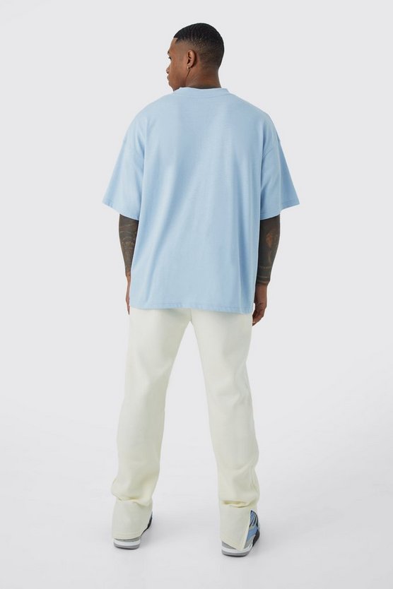 Jogginghose mit geteiltem Saum und Worldwide-Print