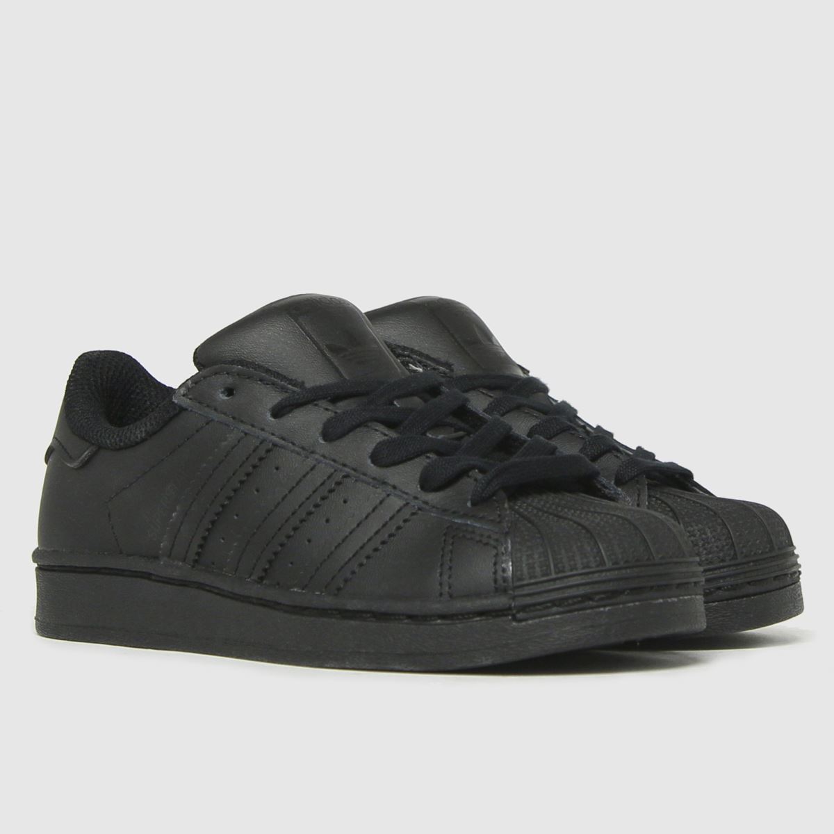 adidas svarta superstar juniorskor