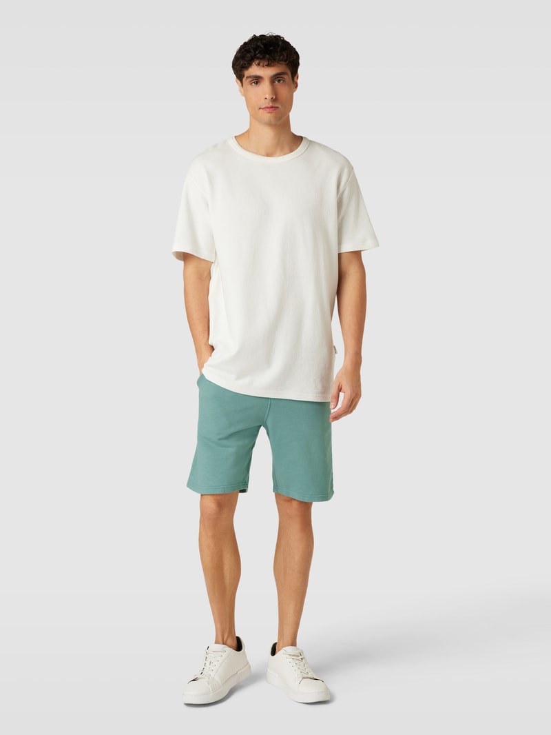 Shorts mit seitlichen Eingrifftaschen in helltürkis