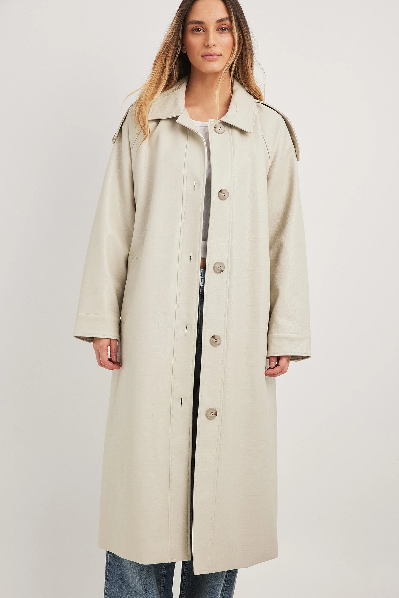 Trenchcoat aus Schlangen-Pu