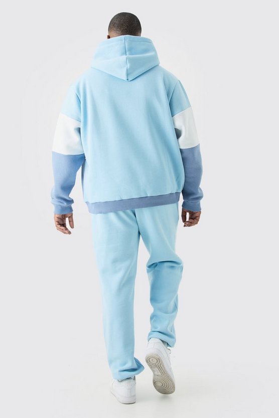 Plus hellblauer Colorblock Man Trainingsanzug mit Kapuze