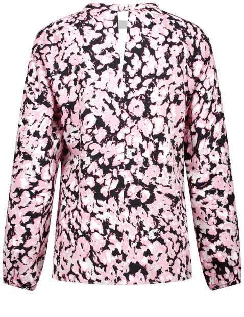 Bluse mit Ausschnittschlitzen
