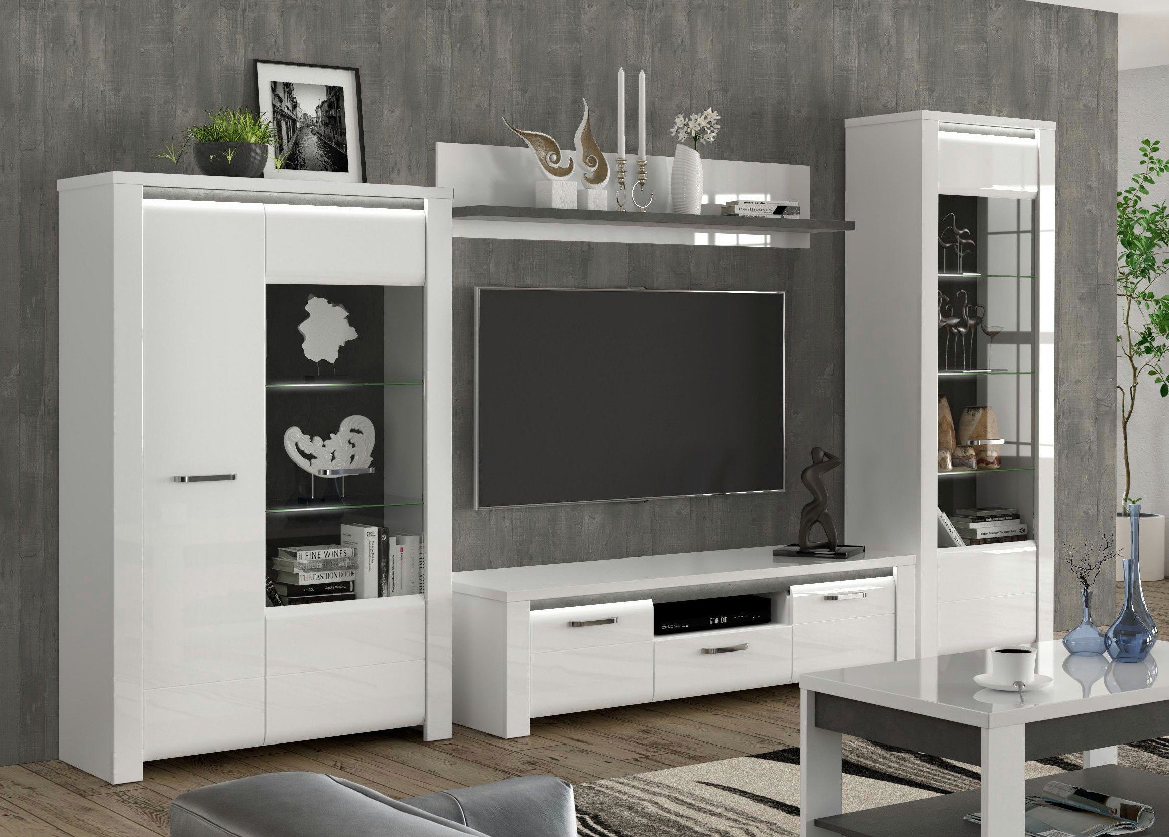 möbel-direkt.de Wohnwand Brugia, (Komplett Set, 4-St., Standvitrine + Hochkommode + Wandboard + TV- Schrank), Hochglanzfronten, Beleuchtung, Selbsteinzug, Dämpfungsbeschläge