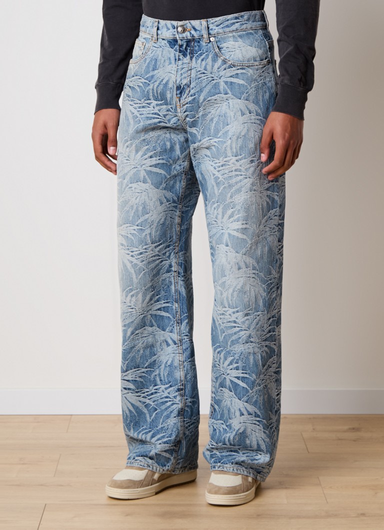 Blugi cu croială largă de la Palm Angels, cu imprimeu tropical.