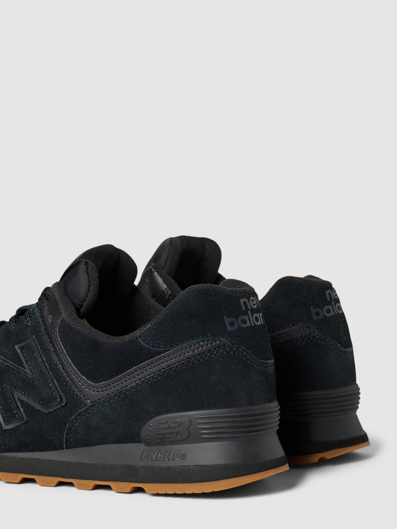 Sneaker aus Leder-Mix in schwarz