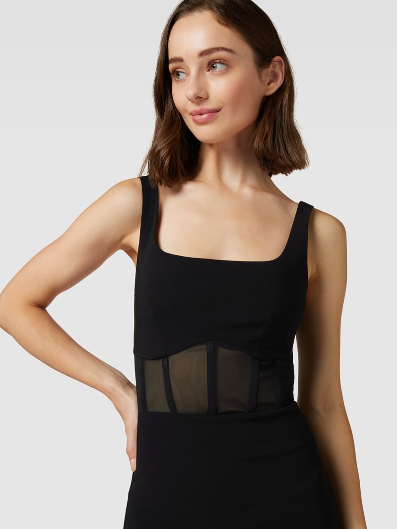 Knielanges Cocktailkleid in semitransparentem Look in schwarz
