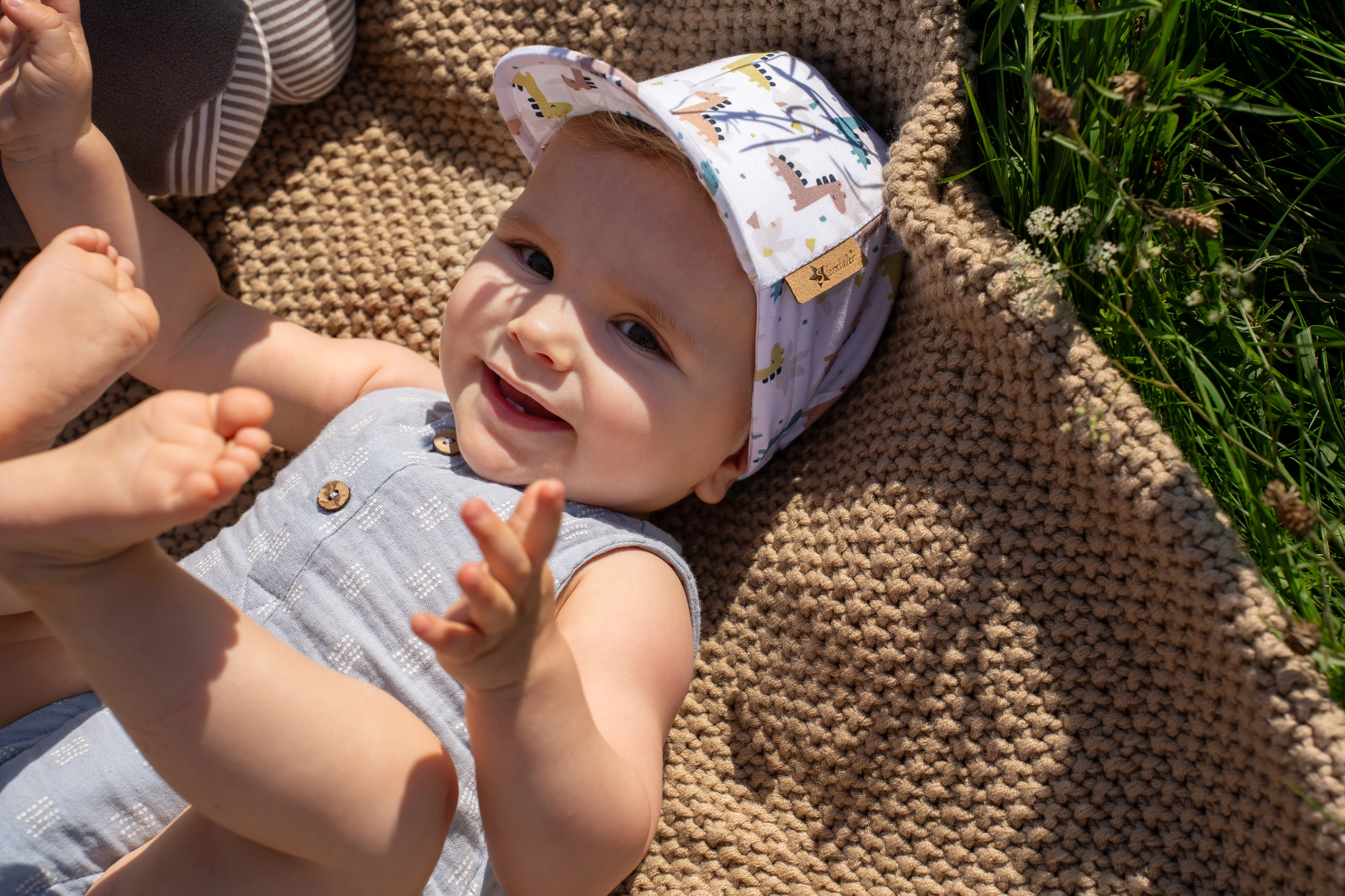 Baby Body ohne Ärmel bedruckt mit Punkten in graublau