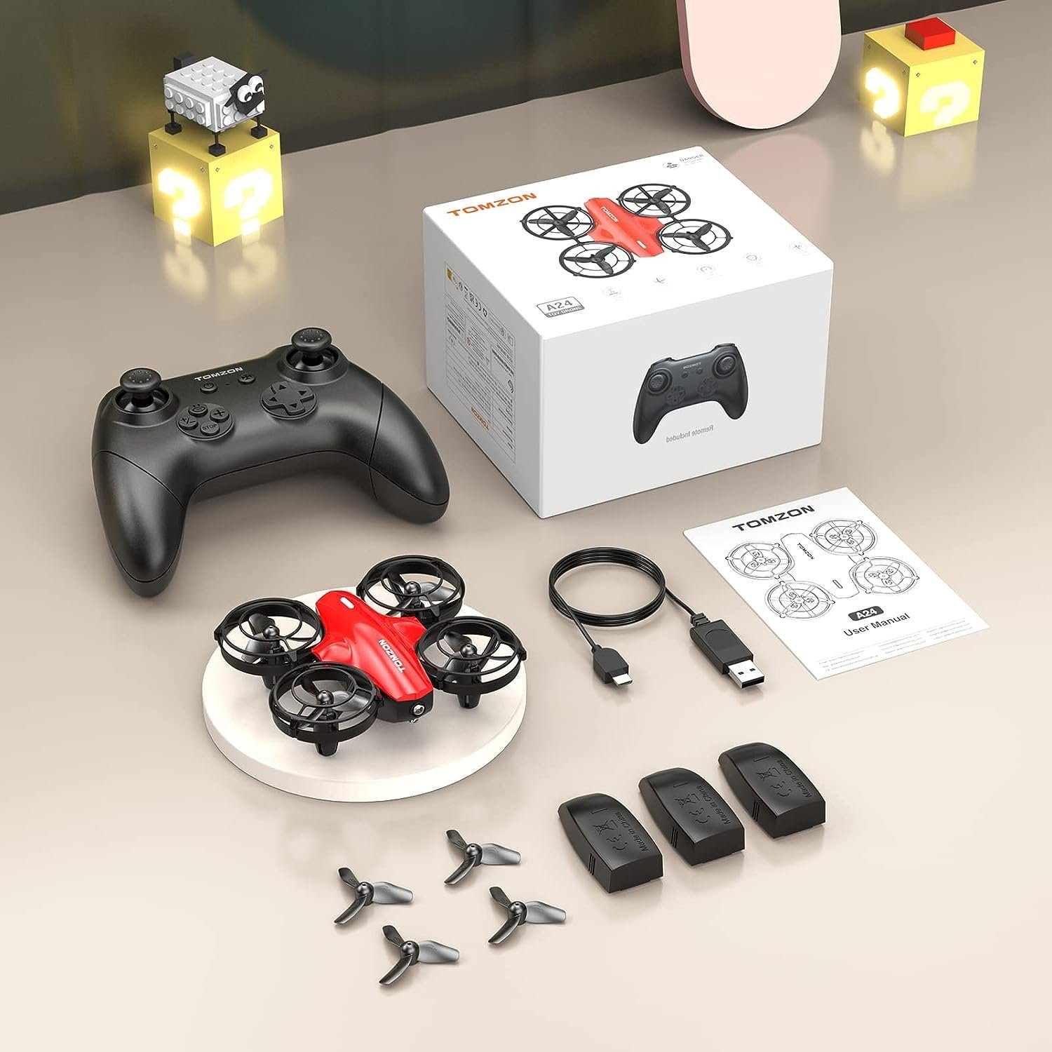 Tomzon mini Drohne für Kinder Anfänger RC Quadrocopter Drohne (mit 24min Lange Flugzeit Kampfdrohne mit 360° Propellerschutz Flugzeug)