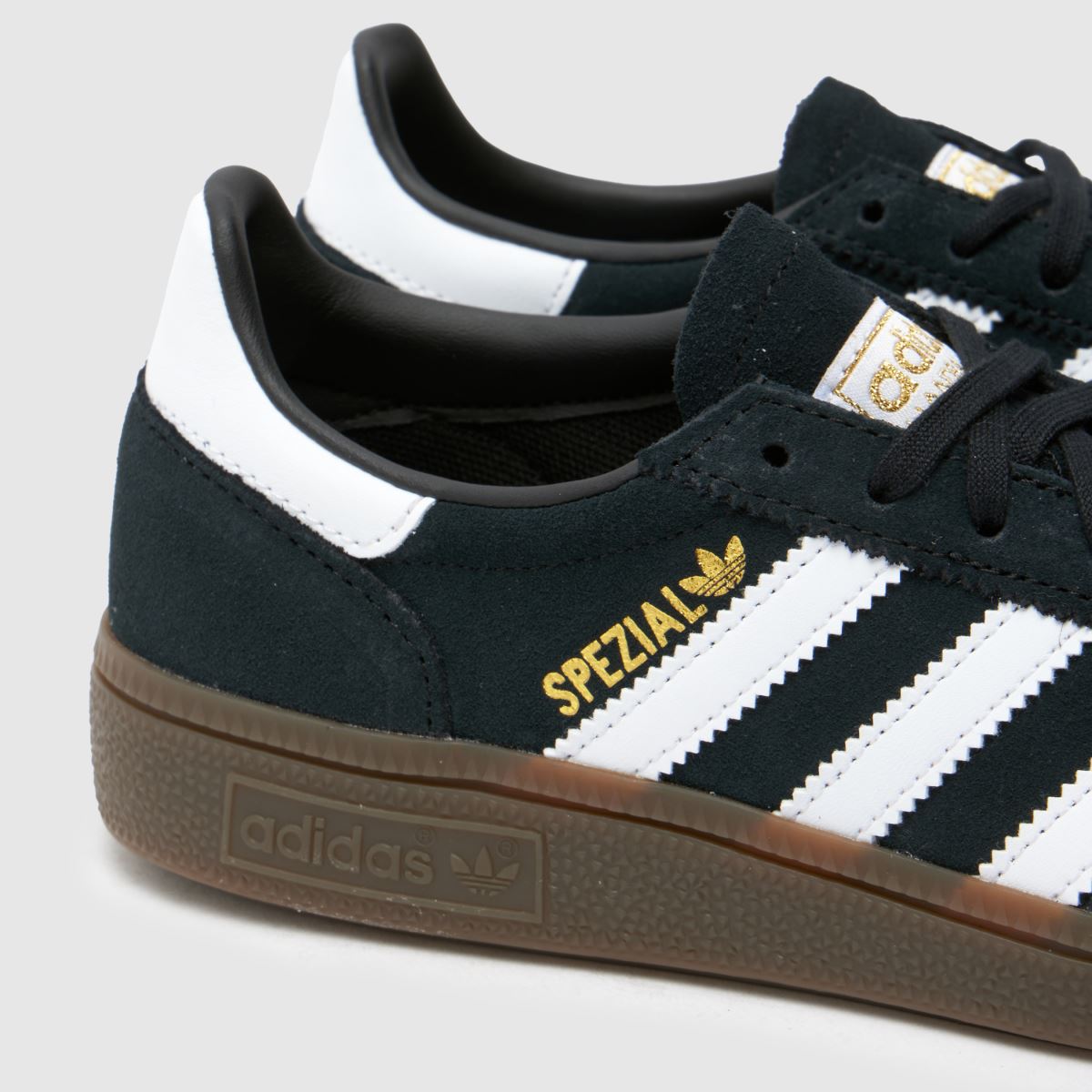 adidas črno-beli otroški športni copati za rokomet