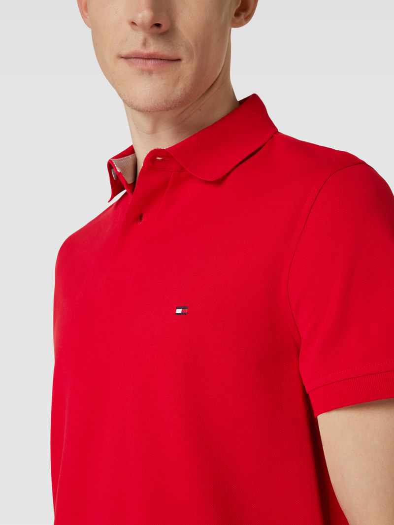 Poloshirt mit Logo-Stitching in rot