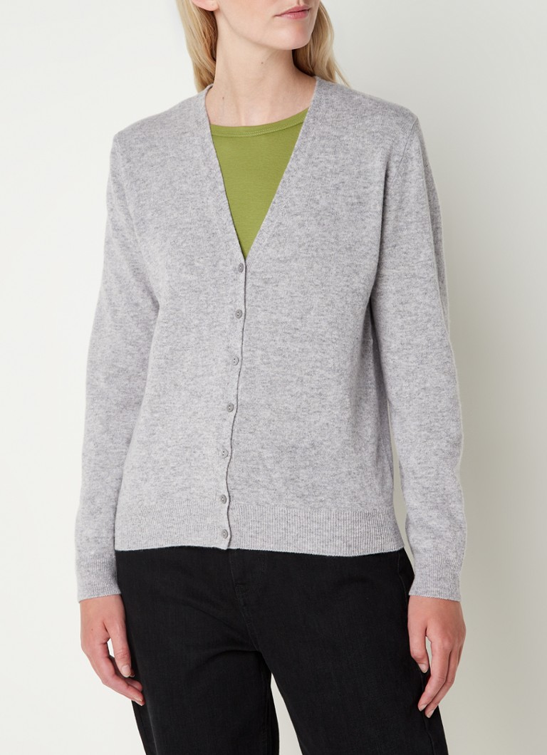 Cardigan Benetton confecționat din lână subțire și flexibilă.