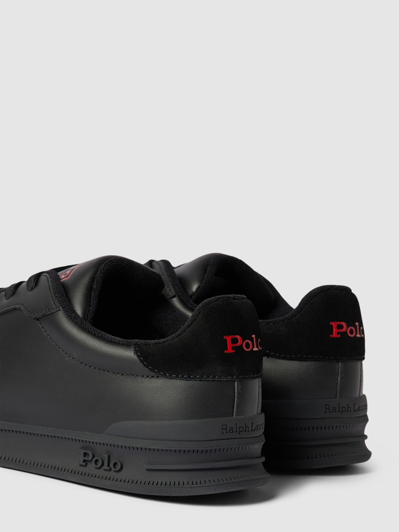 Sneaker mit Label-Details in schwarz