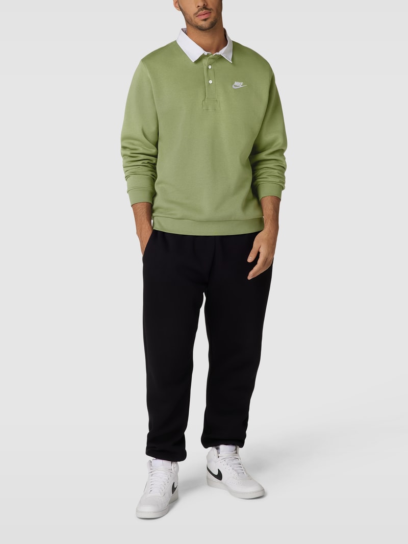 Poloshirt mit Label-Detail und Knopfleiste in hellgrün