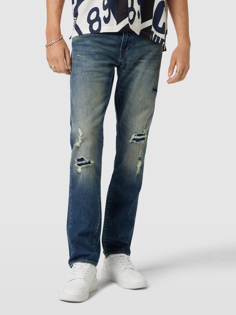 Jeans im Used-Look in jeans