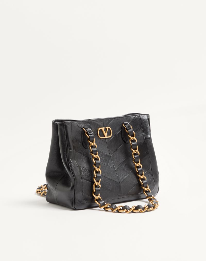 Bolsa de compras pequena Valentino Garavani Laseine em napa com estampa chevron.