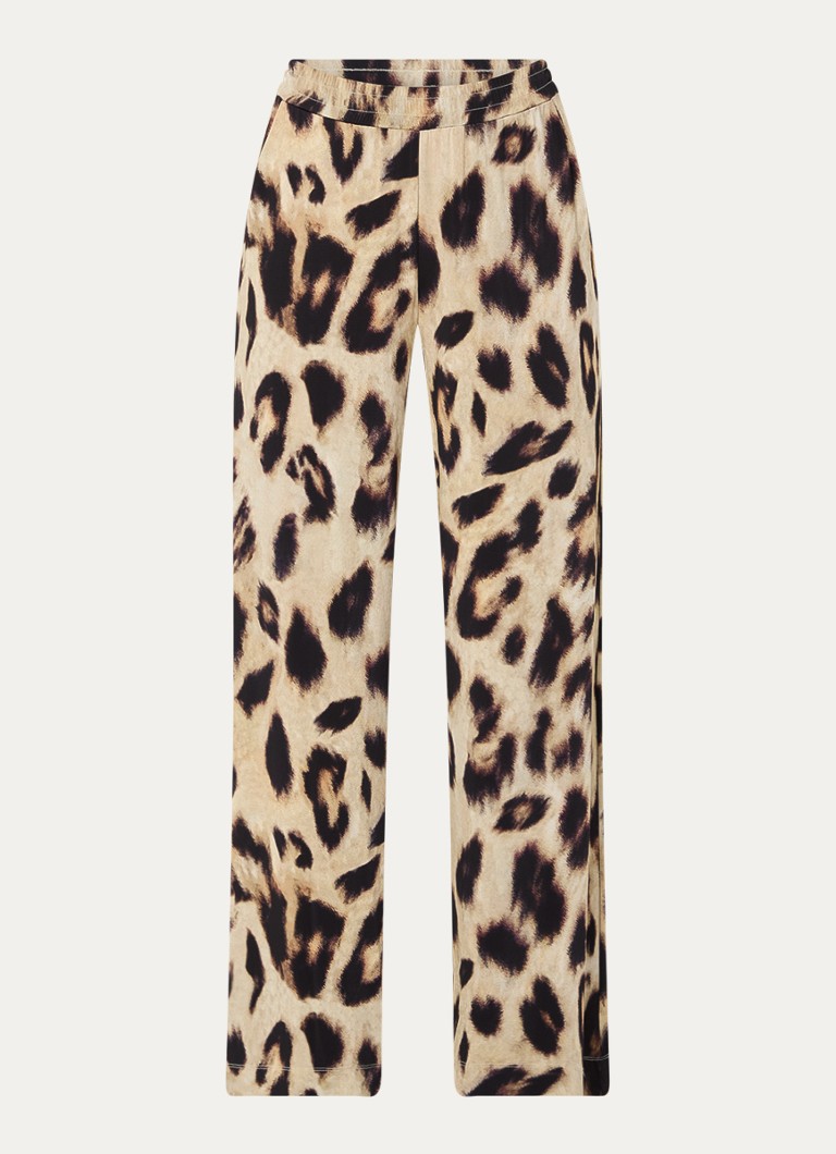 Pantalonii cu talie înaltă și croială largă, de la Claudia Sträter, prezintă un imprimeu leopard și buzunare laterale.