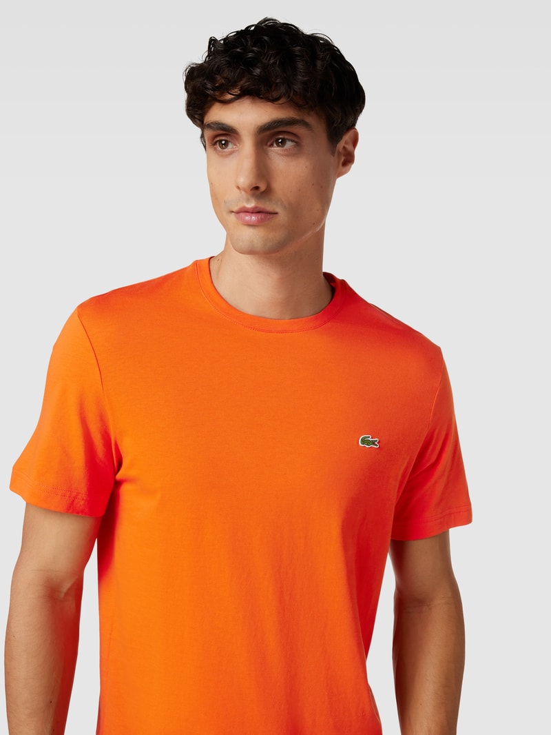 T-Shirt mit Logo-Patch in orange