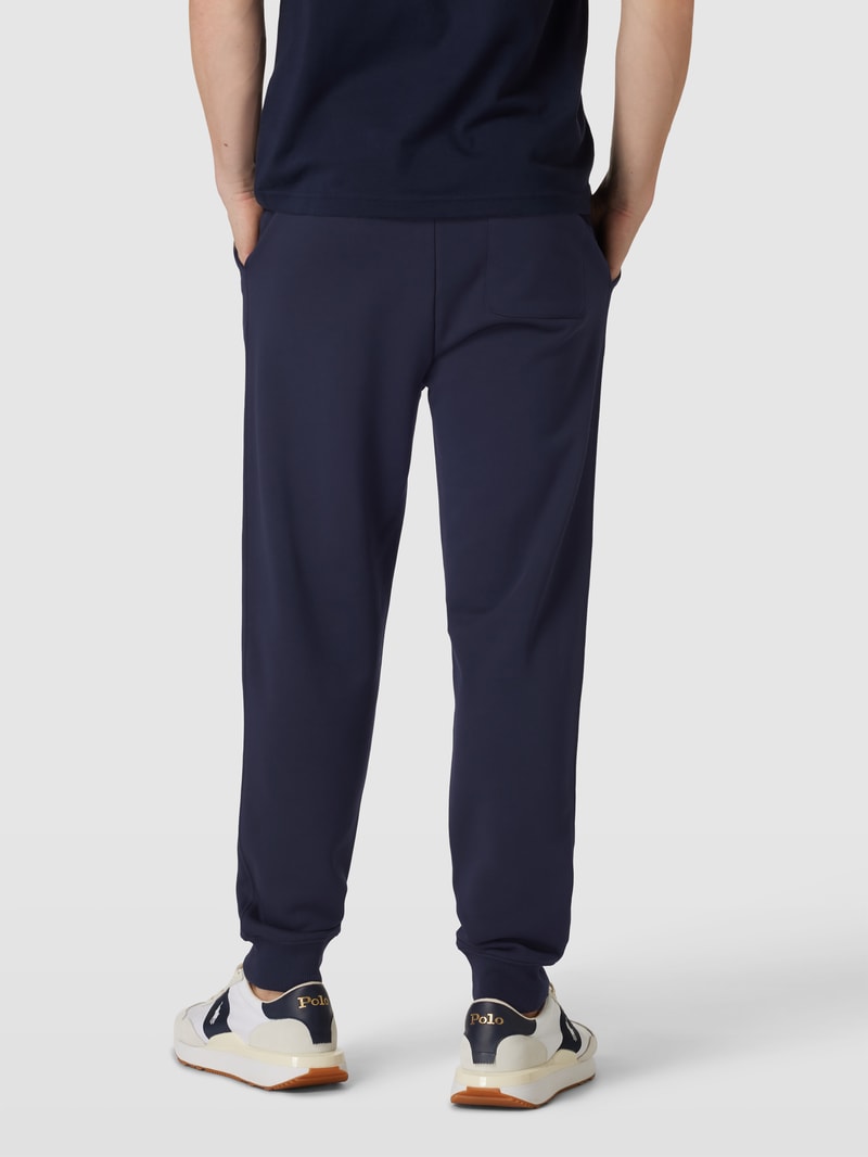 Sweatpants mit Label-Stitching Modell 'SHIELD' in marineblau