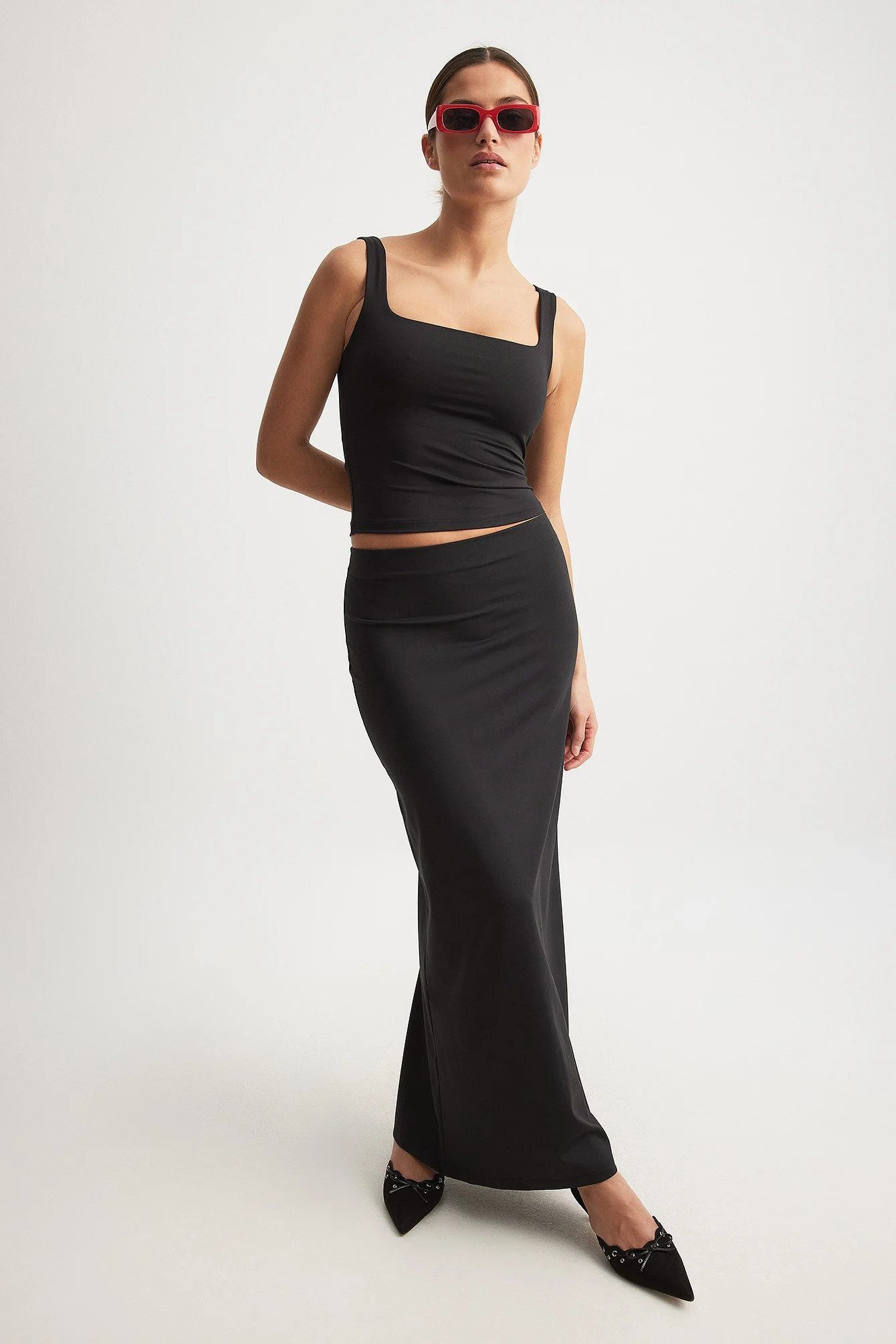Eng anliegender Rock mit niedriger Taille