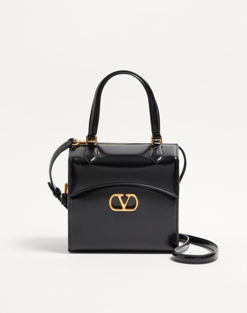 Bolsa Valentino Garavani Vain-Case em couro de bezerro brilhante