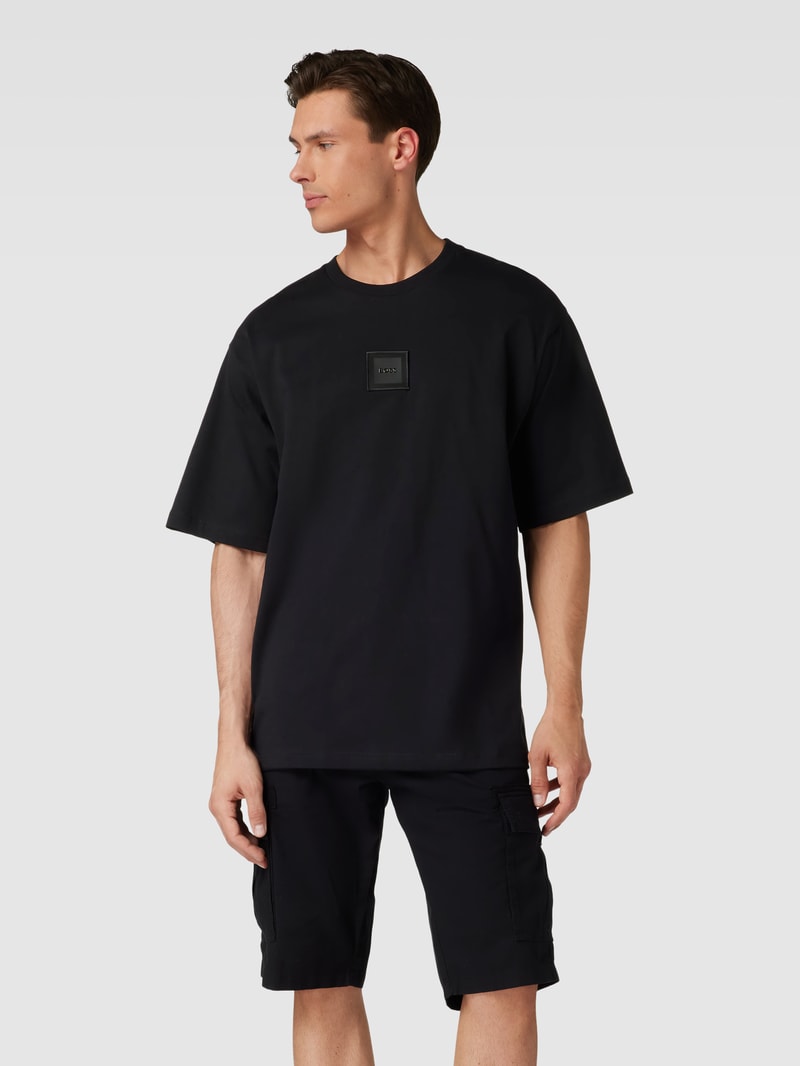Oversized T-Shirt mit Label-Detail Modell 'Talboa Lotus' in schwarz