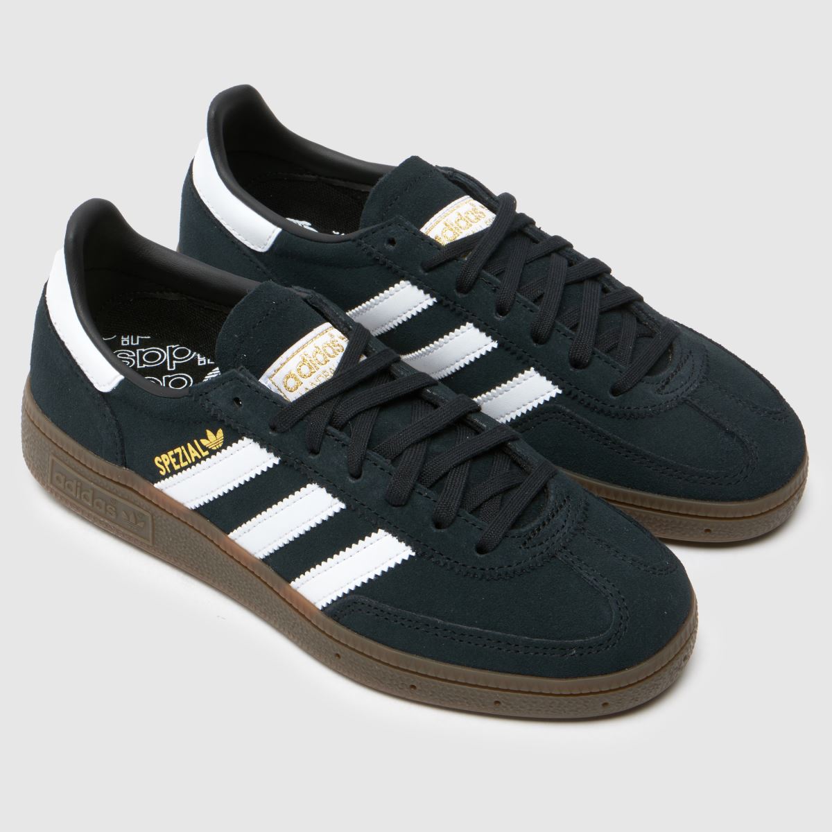 adidas črno-beli otroški športni copati za rokomet