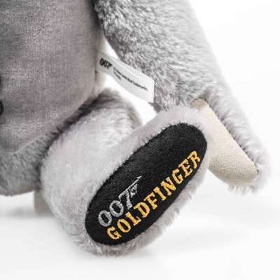 James Bond Goldfinger 60. Jubiläum Teddybär mit Musikwerk, 30 cm, hellgrau