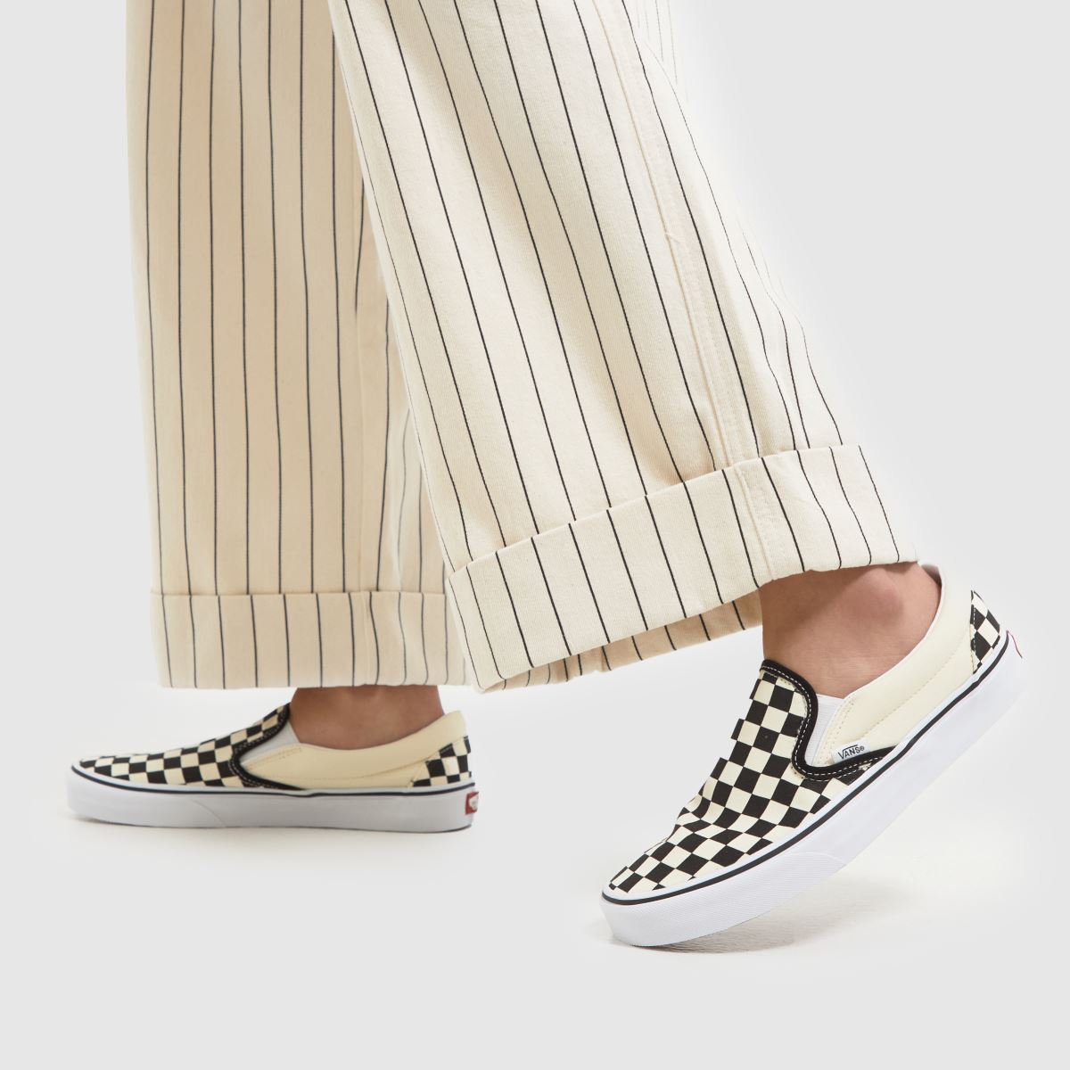 Vans – Schackrutiga klassiska slip-on-sneakers i svart och krämfärgat