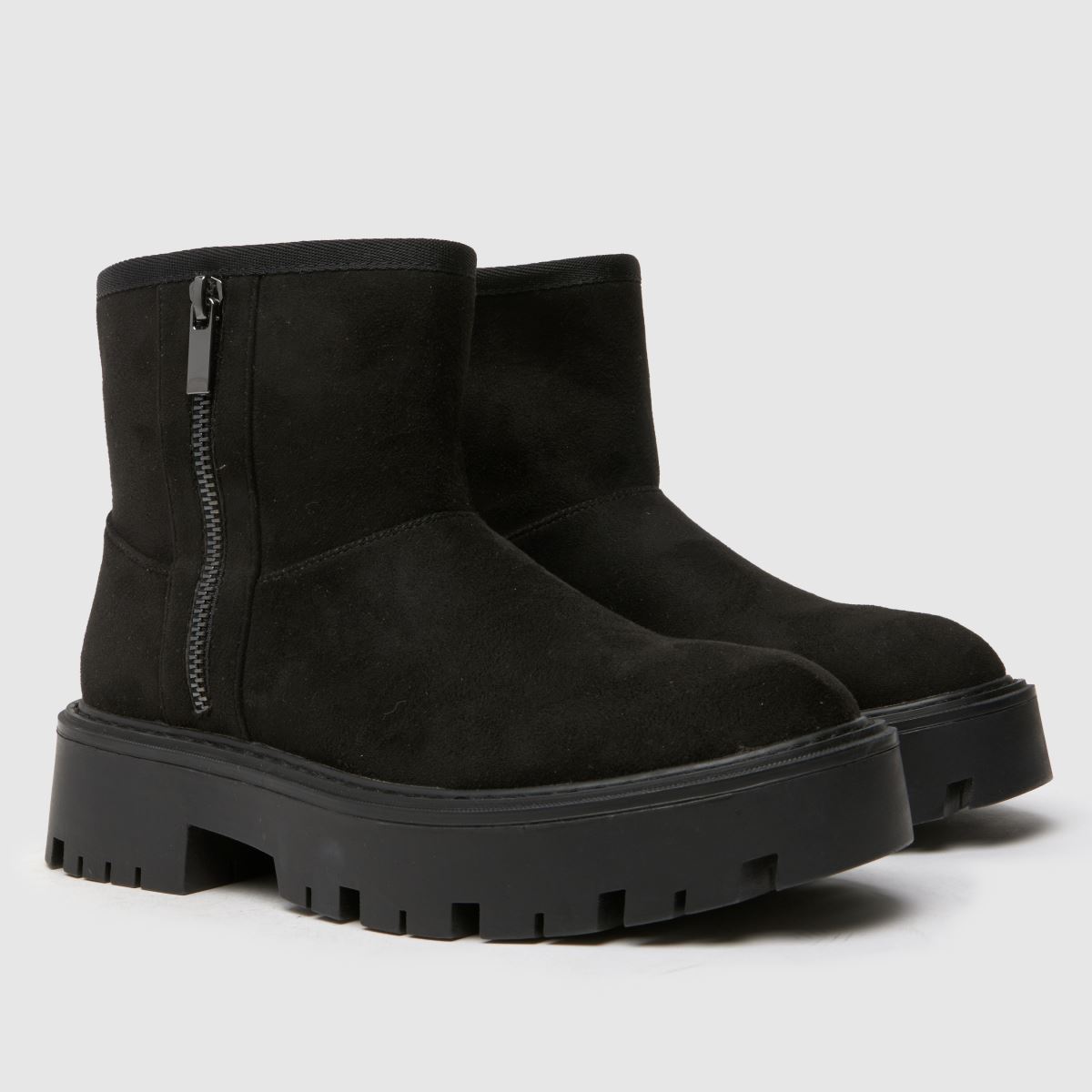 Schuh Carman – Svarta stövlar i fuskpäls