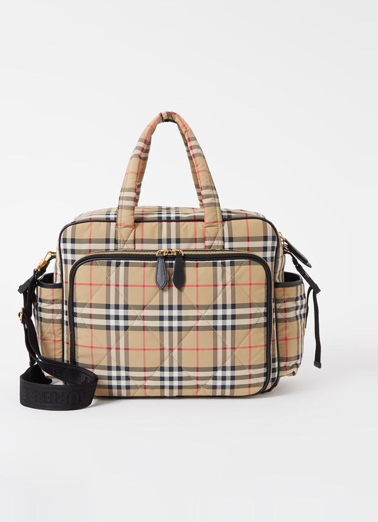 Burberryn ruutukuvioinen hoitolaukku ja hoitoalusta