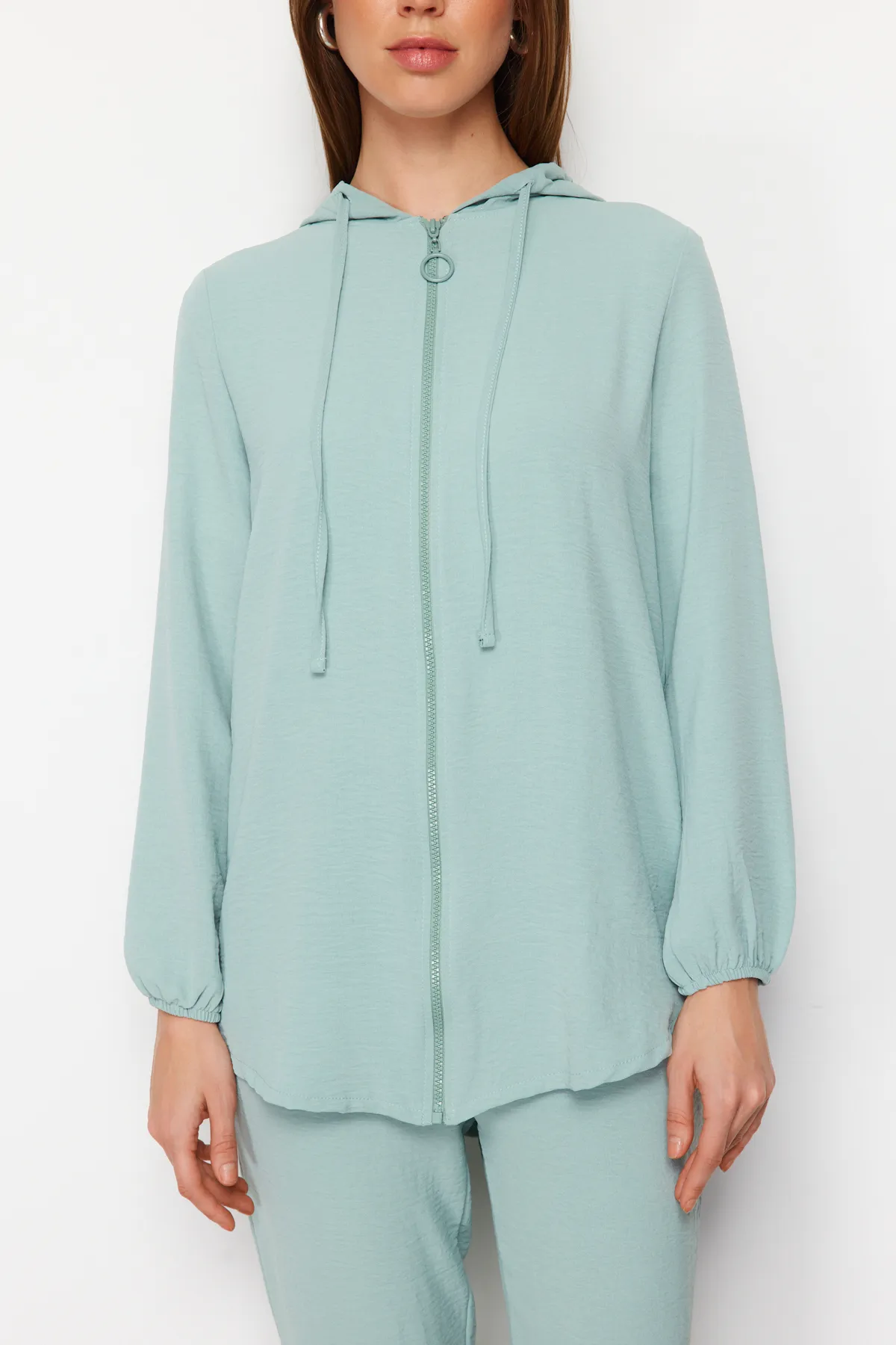 Trendyol Modest  Mintgrünes Aerobin-Cardigan-Hose-Set mit Kapuze und Reißverschluss TCTSS22US0026