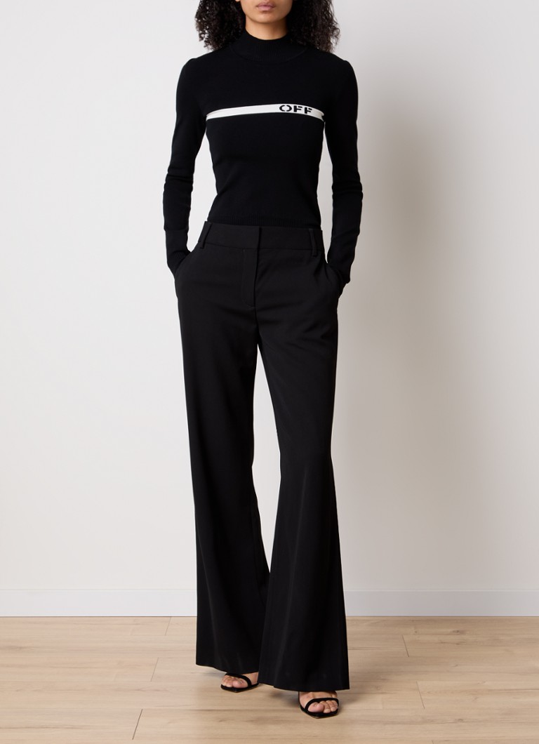 Pantaloni Off-White cu talie înaltă, cu talie largă și buzunare laterale.