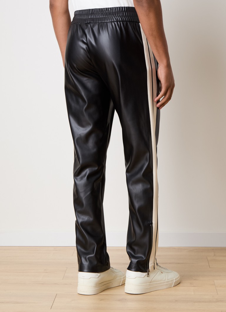 Pantaloni de trening din piele ecologică cu logo Palm Angels, cu talie conică pe picior
