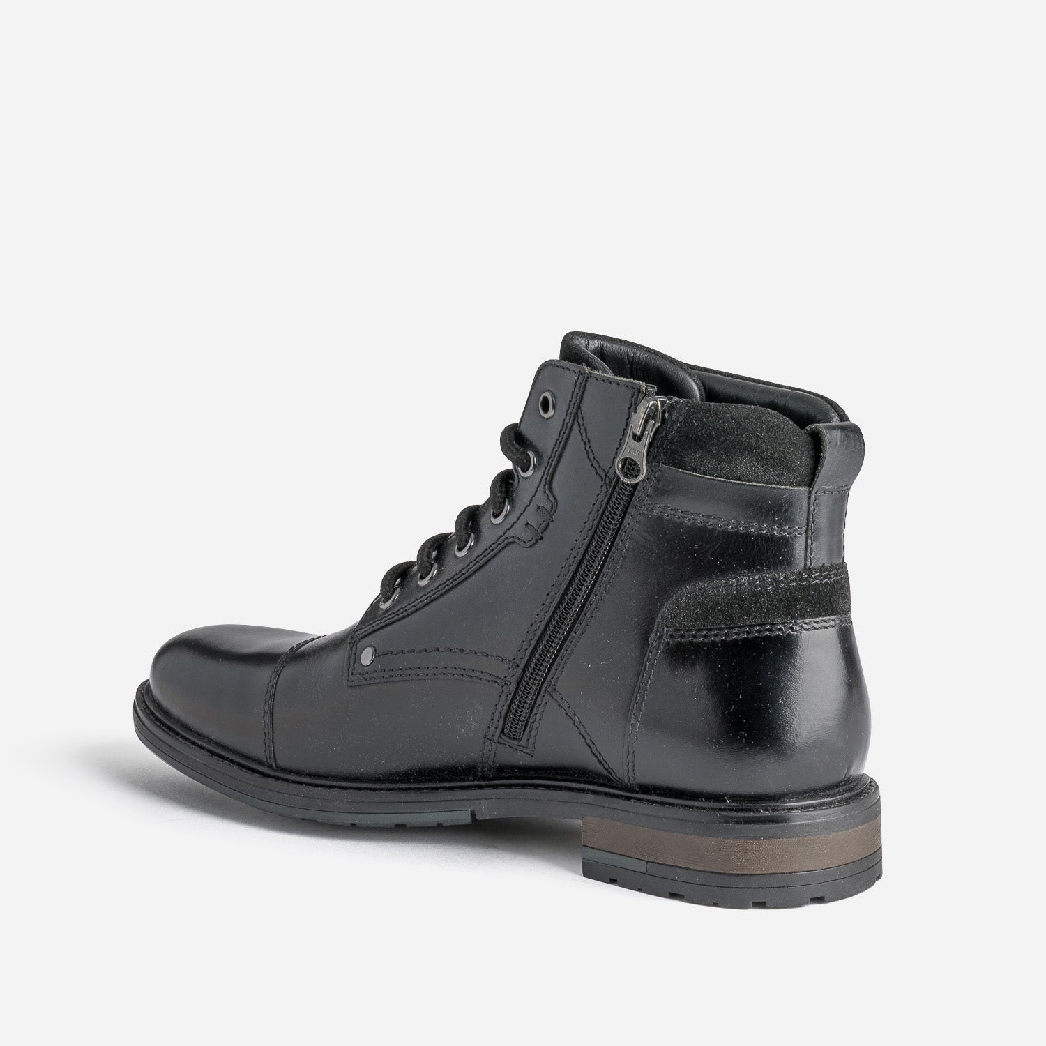 Bottine noire en cuir décor zip et boucle