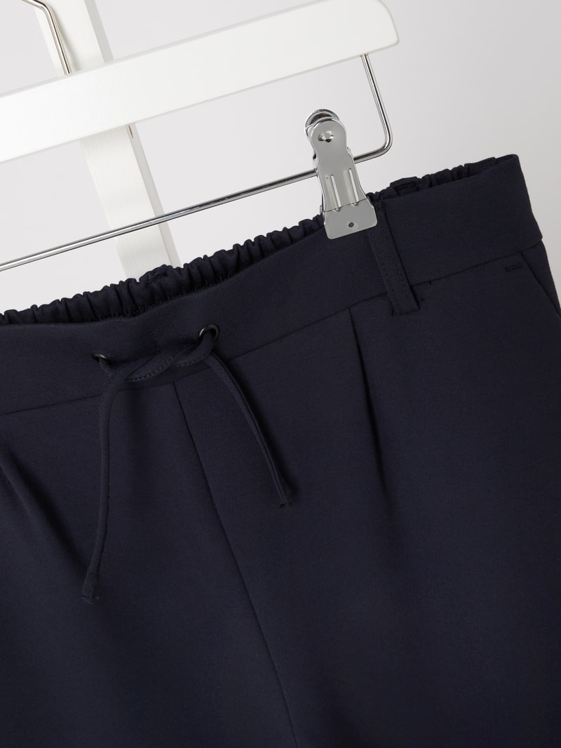 Bundfaltenhose mit zulaufendem Bein und Tunnelzug in marineblau