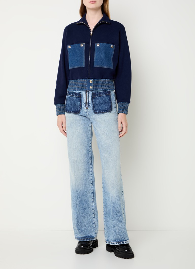 Gilet Sandro in maglia fine con dettagli in denim.