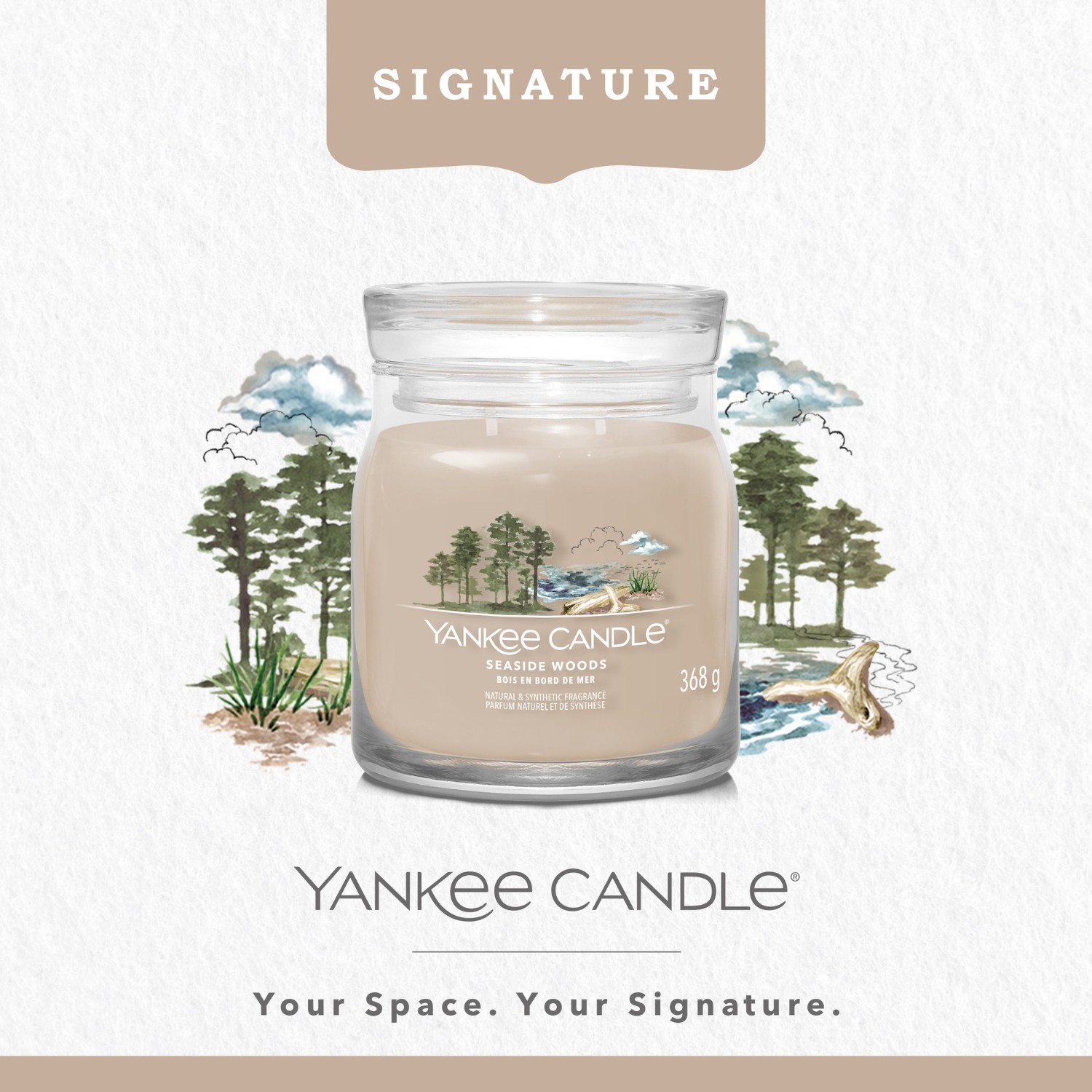 Candela Yankee in barattolo di legno medio, in riva al mare.