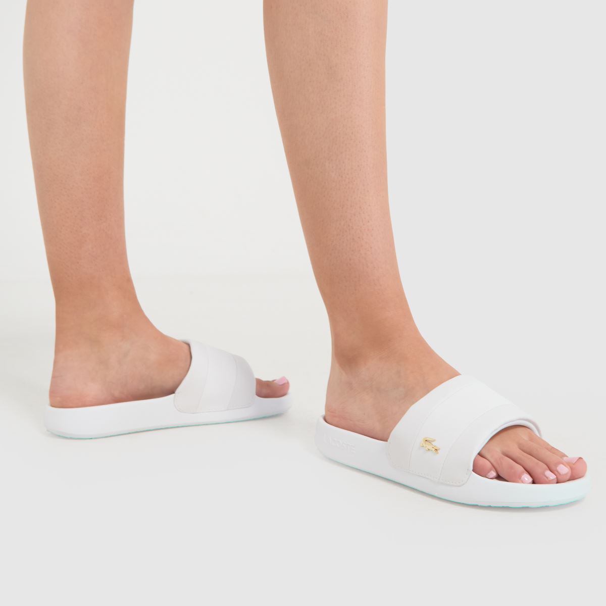 Lacoste – Serve – Vita hybridsandaler med tofs