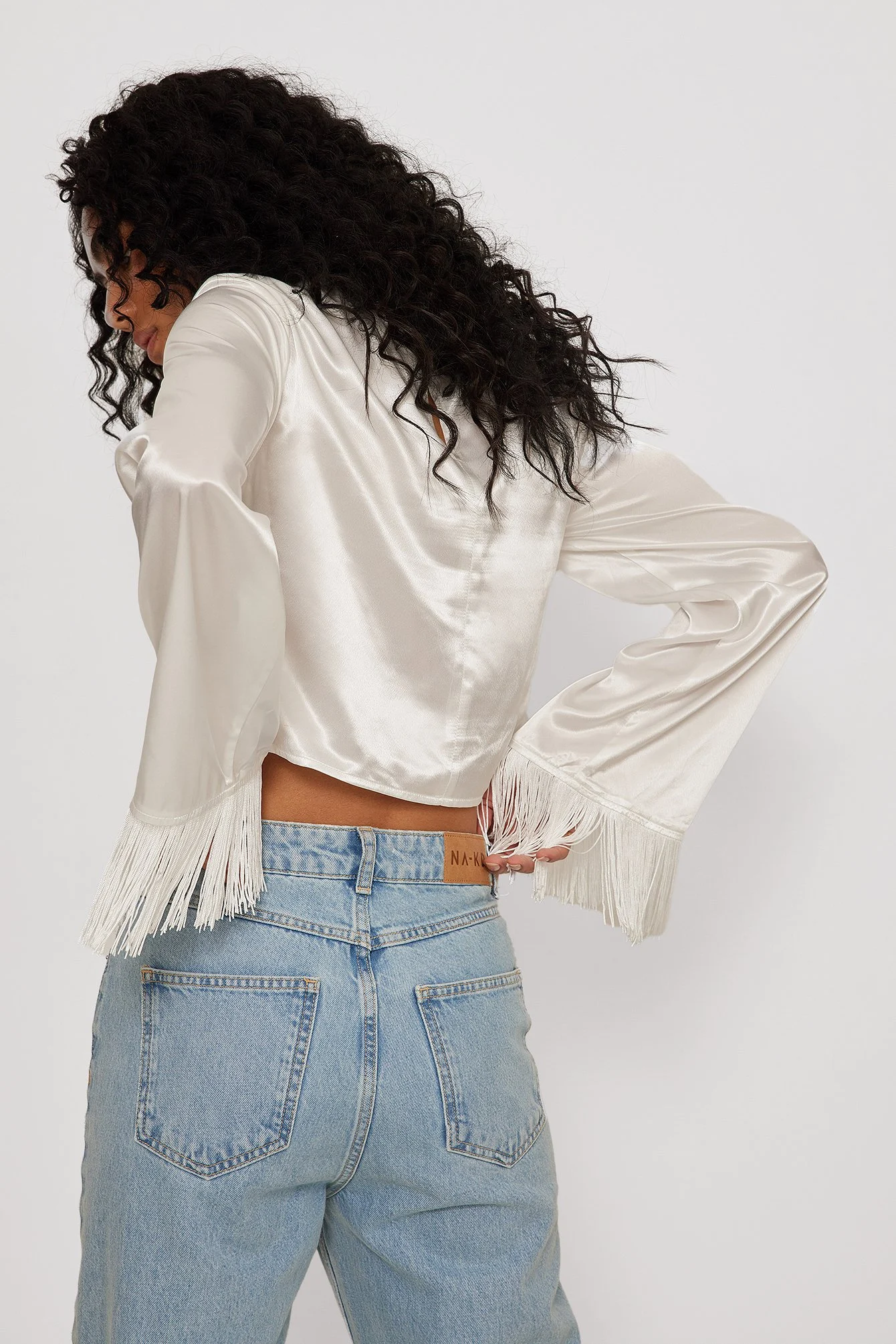 Bluse mit einem Ausschnitt-Detail und Fransen-Details