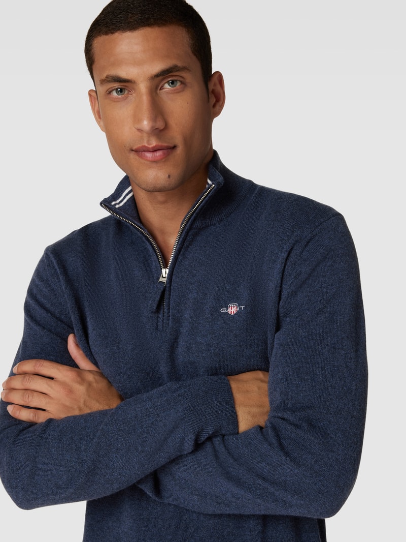 Strickpullover aus Wolle mit kurzem Reißverschluss in marineblau meliert