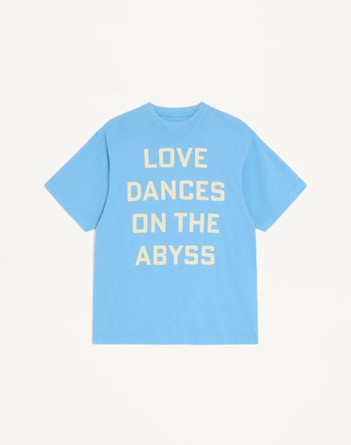 Valentino katoenen T-shirt met print 'Love Dances On The Abyss' en 'Made In Valentino'.