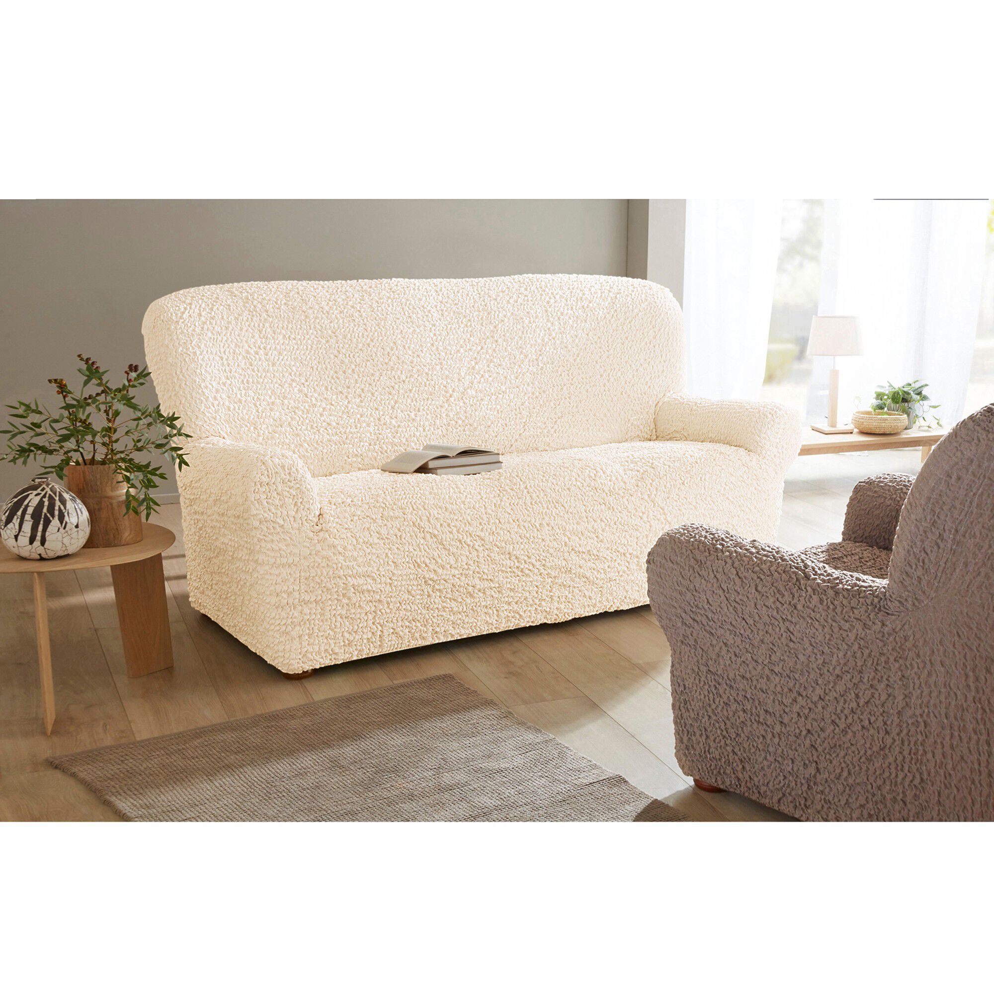 Housse gaufrée bi-extensible canapé fauteuil accoudoirs