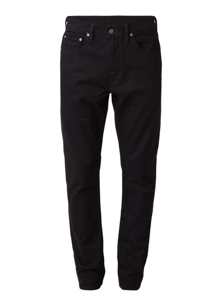 „Levi's 512“ aukštais, siaurėjančiais džinsais