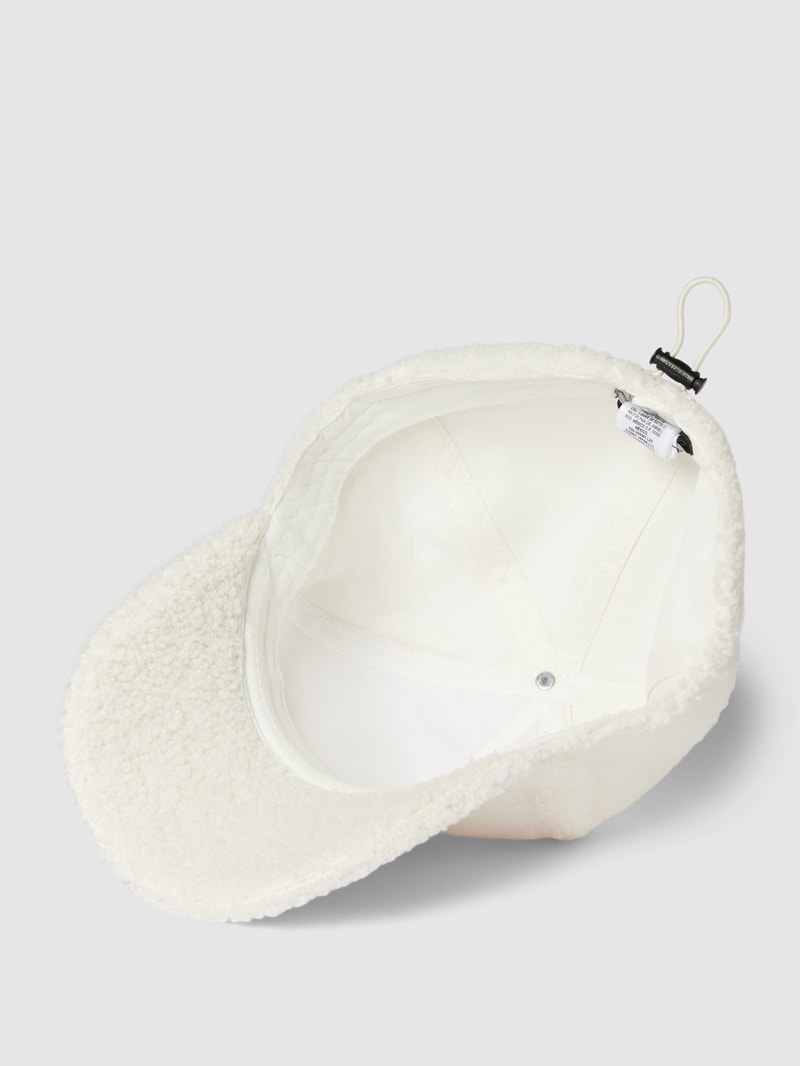 Basecap aus Teddyfell in offwhite