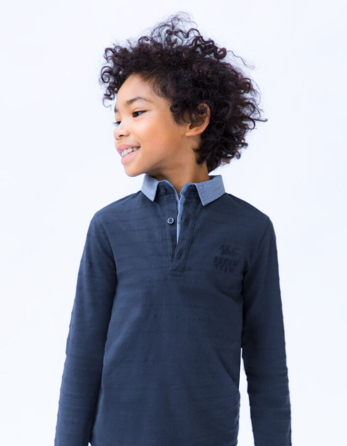 Polo marine col chemise et visuel embossé dos garçon