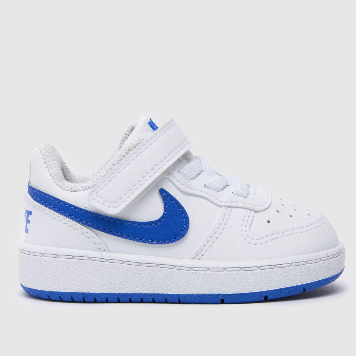 Bílo-tmavomodré nízké tenisky Nike Court Borough pro chlapce a batolata